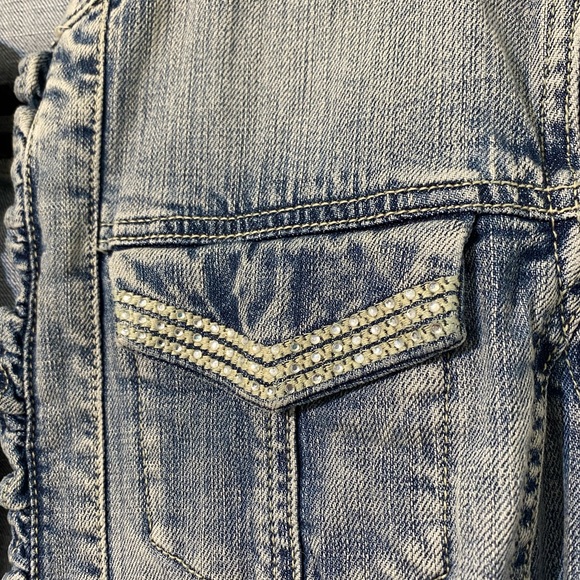 Chico’s Platinum Ruffled Jean jacket with rhinestone pockets and buttons.Size 8 - Picture 4 of 12